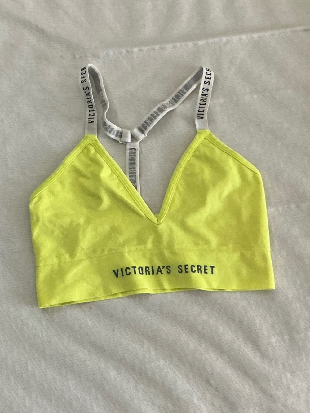 Victoria's Secret yellow bralette with logo straps